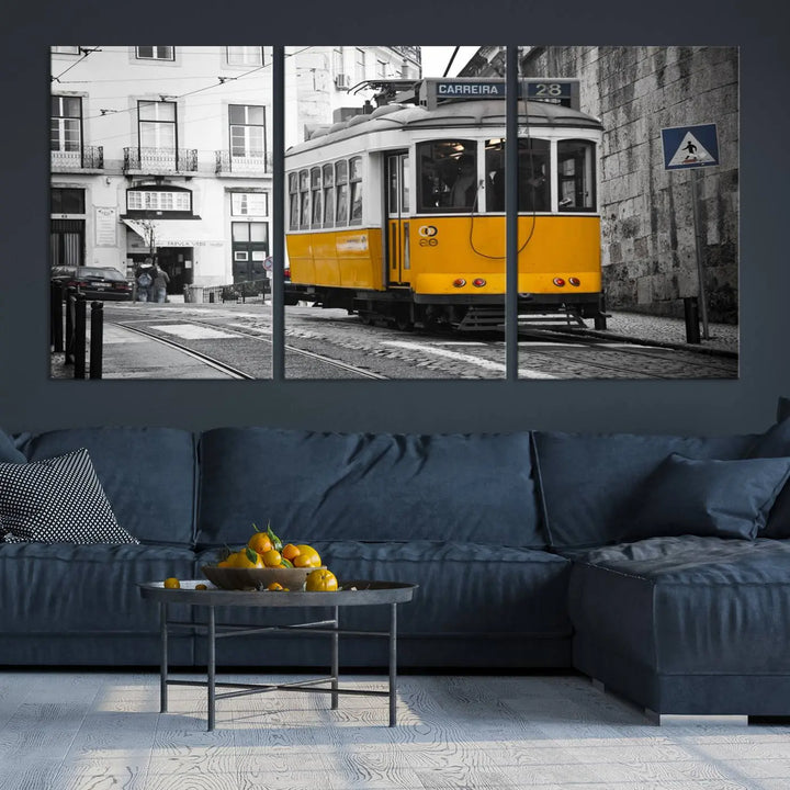 The wall art in the room features gallery-wrapped canvases with the "Old Yellow Tram Canvas Wall Art Canvas Print," which depicts a yellow tram against black-and-white city streets.