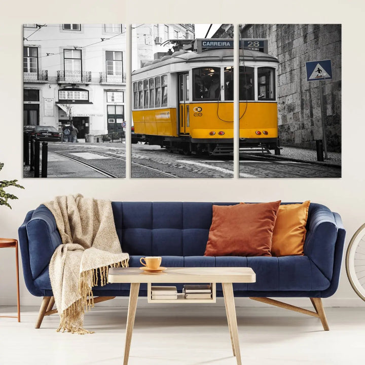 The wall art in the room features gallery-wrapped canvases with the "Old Yellow Tram Canvas Wall Art Canvas Print," which depicts a yellow tram against black-and-white city streets.