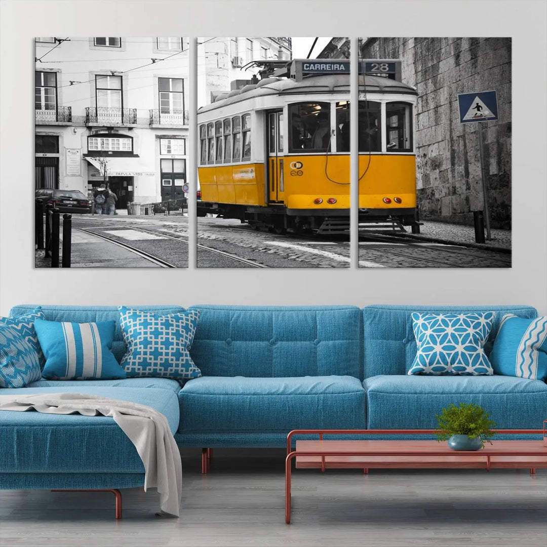 The wall art in the room features gallery-wrapped canvases with the "Old Yellow Tram Canvas Wall Art Canvas Print," which depicts a yellow tram against black-and-white city streets.