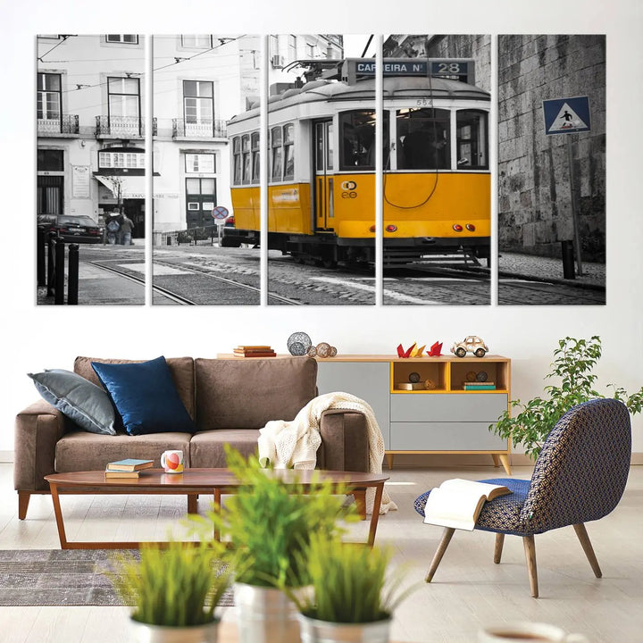 The wall art in the room features gallery-wrapped canvases with the "Old Yellow Tram Canvas Wall Art Canvas Print," which depicts a yellow tram against black-and-white city streets.