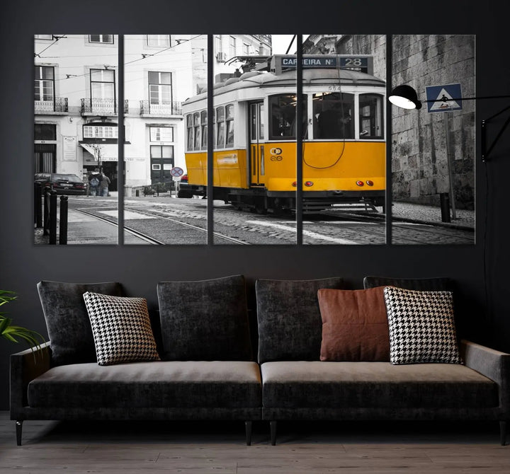 The wall art in the room features gallery-wrapped canvases with the "Old Yellow Tram Canvas Wall Art Canvas Print," which depicts a yellow tram against black-and-white city streets.