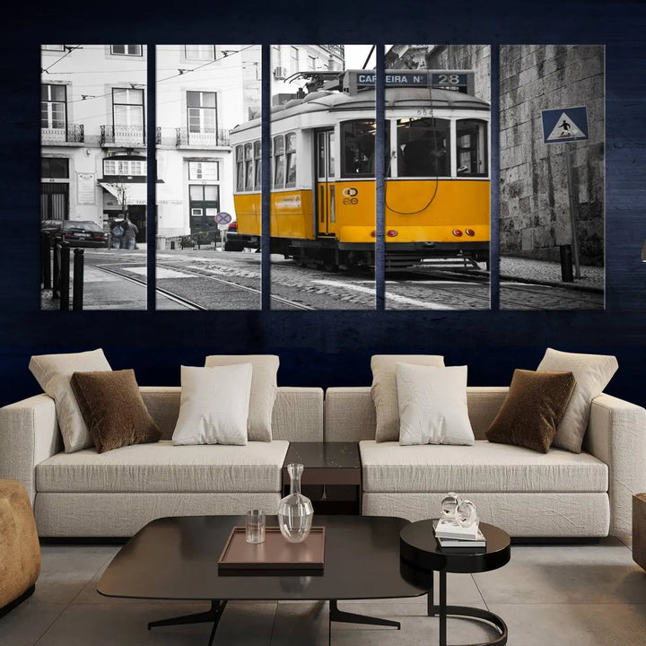 The wall art in the room features gallery-wrapped canvases with the "Old Yellow Tram Canvas Wall Art Canvas Print," which depicts a yellow tram against black-and-white city streets.