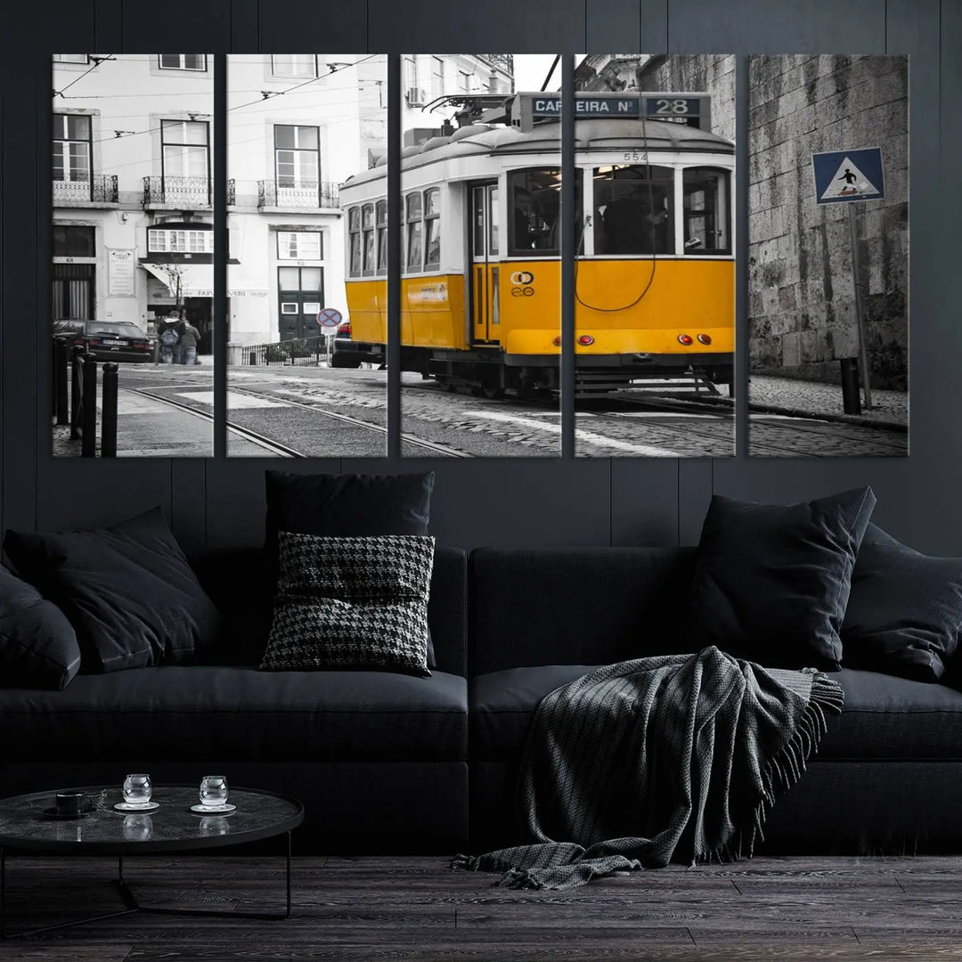 The wall art in the room features gallery-wrapped canvases with the "Old Yellow Tram Canvas Wall Art Canvas Print," which depicts a yellow tram against black-and-white city streets.