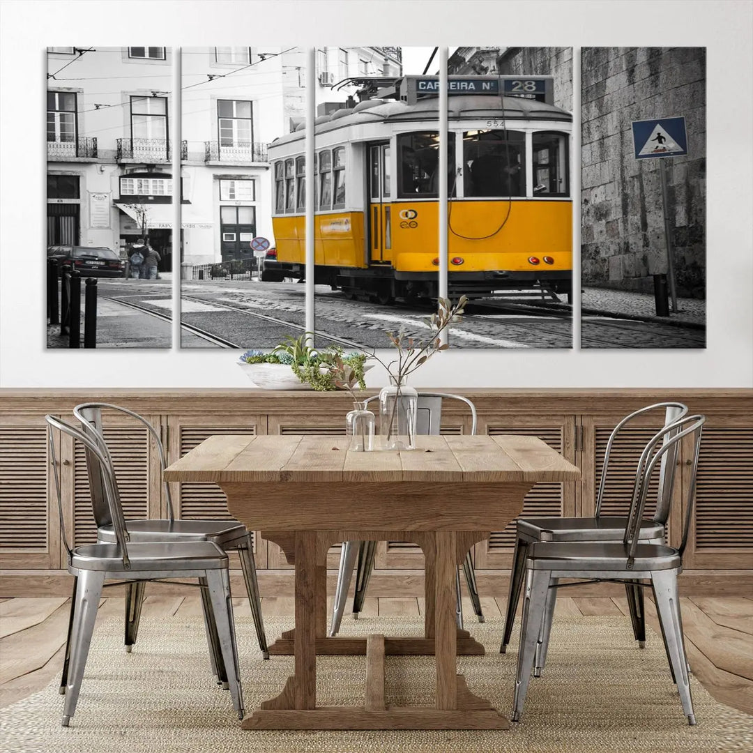 The wall art in the room features gallery-wrapped canvases with the "Old Yellow Tram Canvas Wall Art Canvas Print," which depicts a yellow tram against black-and-white city streets.