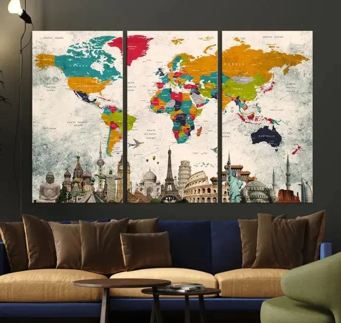 The Orange Green World Map Wall Art Canvas Print, featuring a tri-panel design with vibrant countries and renowned landmarks, is beautifully displayed.