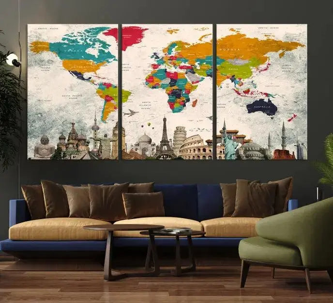 The Orange Green World Map Wall Art Canvas Print, featuring a tri-panel design with vibrant countries and renowned landmarks, is beautifully displayed.