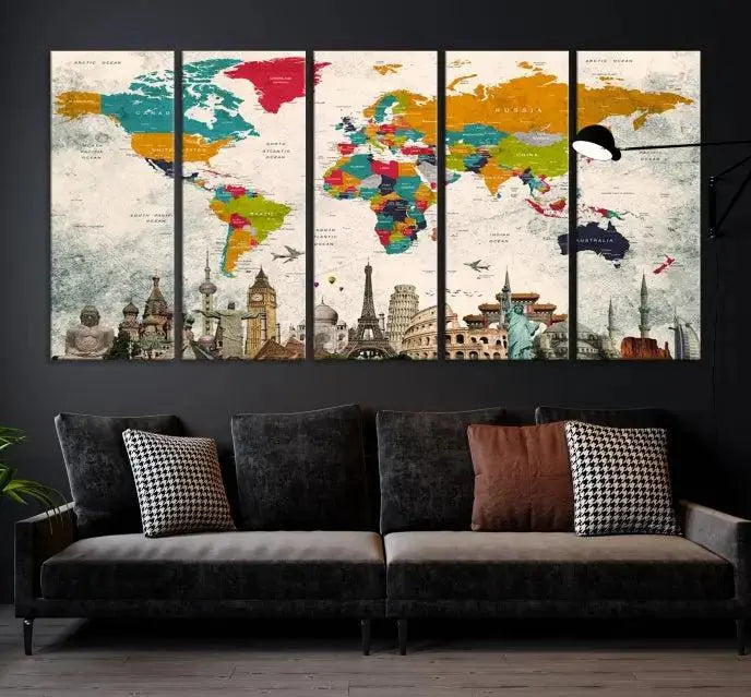 The Orange Green World Map Wall Art Canvas Print, featuring a tri-panel design with vibrant countries and renowned landmarks, is beautifully displayed.