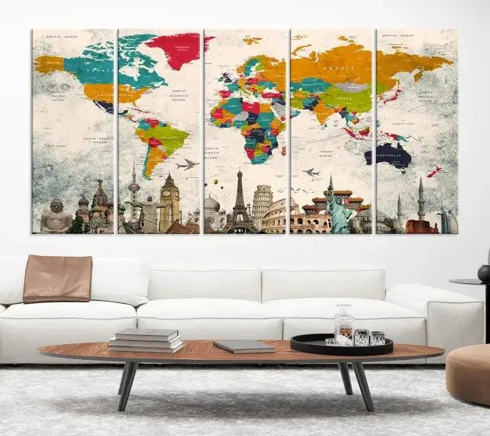 The Orange Green World Map Wall Art Canvas Print, featuring a tri-panel design with vibrant countries and renowned landmarks, is beautifully displayed.