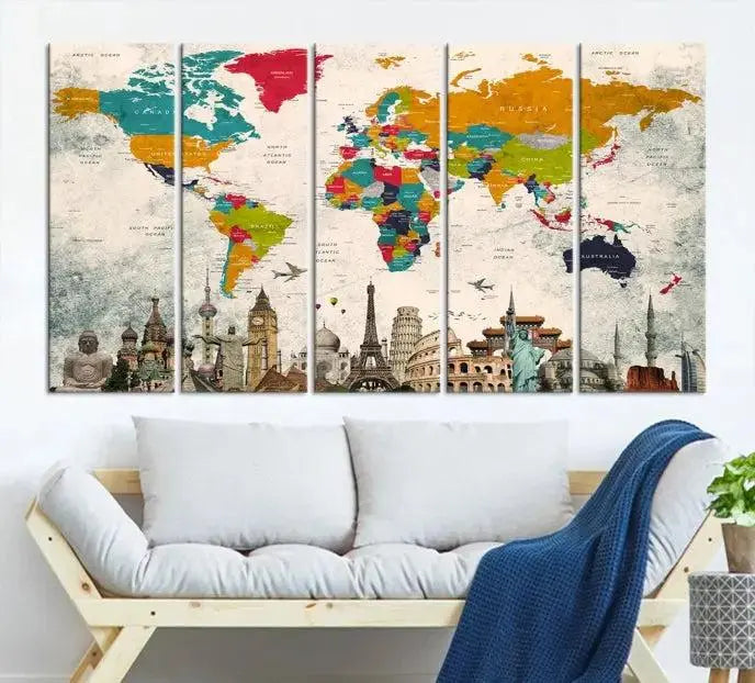 The Orange Green World Map Wall Art Canvas Print, featuring a tri-panel design with vibrant countries and renowned landmarks, is beautifully displayed.