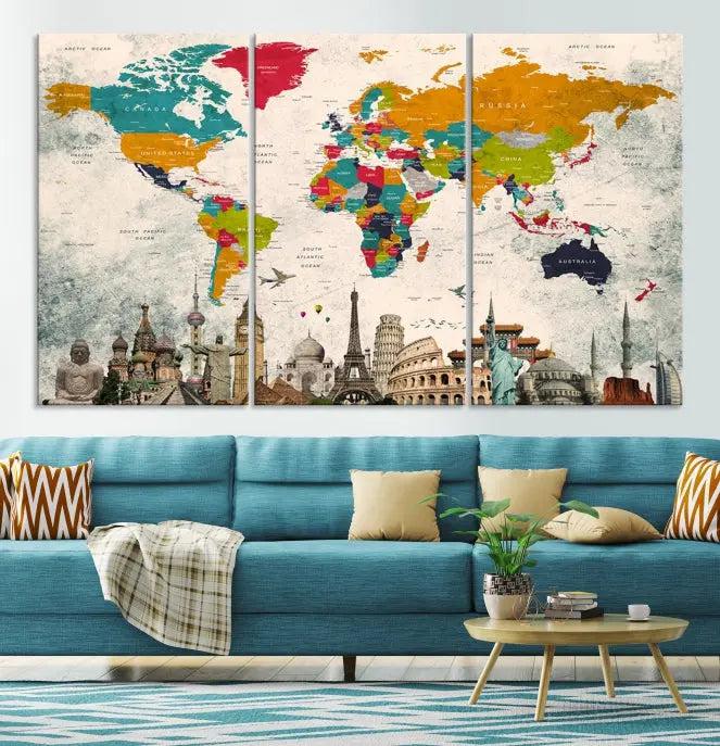 The Orange Green World Map Wall Art Canvas Print, featuring a tri-panel design with vibrant countries and renowned landmarks, is beautifully displayed.