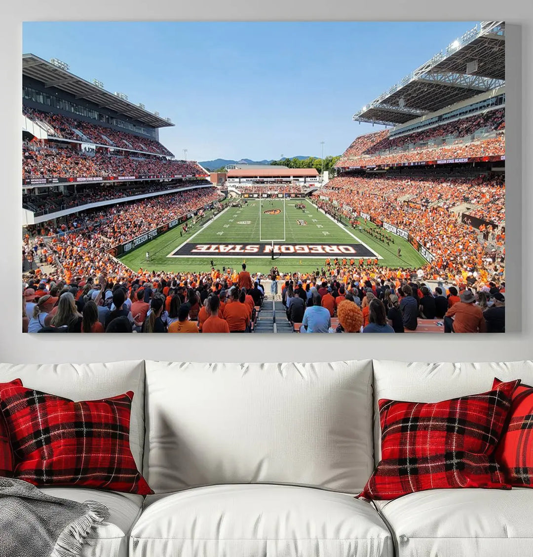 The Oregon State Beavers Football Team Print, featuring a vibrant depiction of Corvallis Reser Stadium on museum-quality canvas, adorns the room.