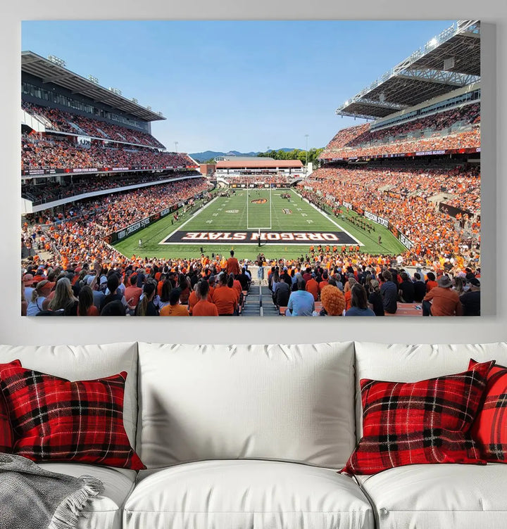 The Oregon State Beavers Football Team Print, featuring a vibrant depiction of Corvallis Reser Stadium on museum-quality canvas, adorns the room.