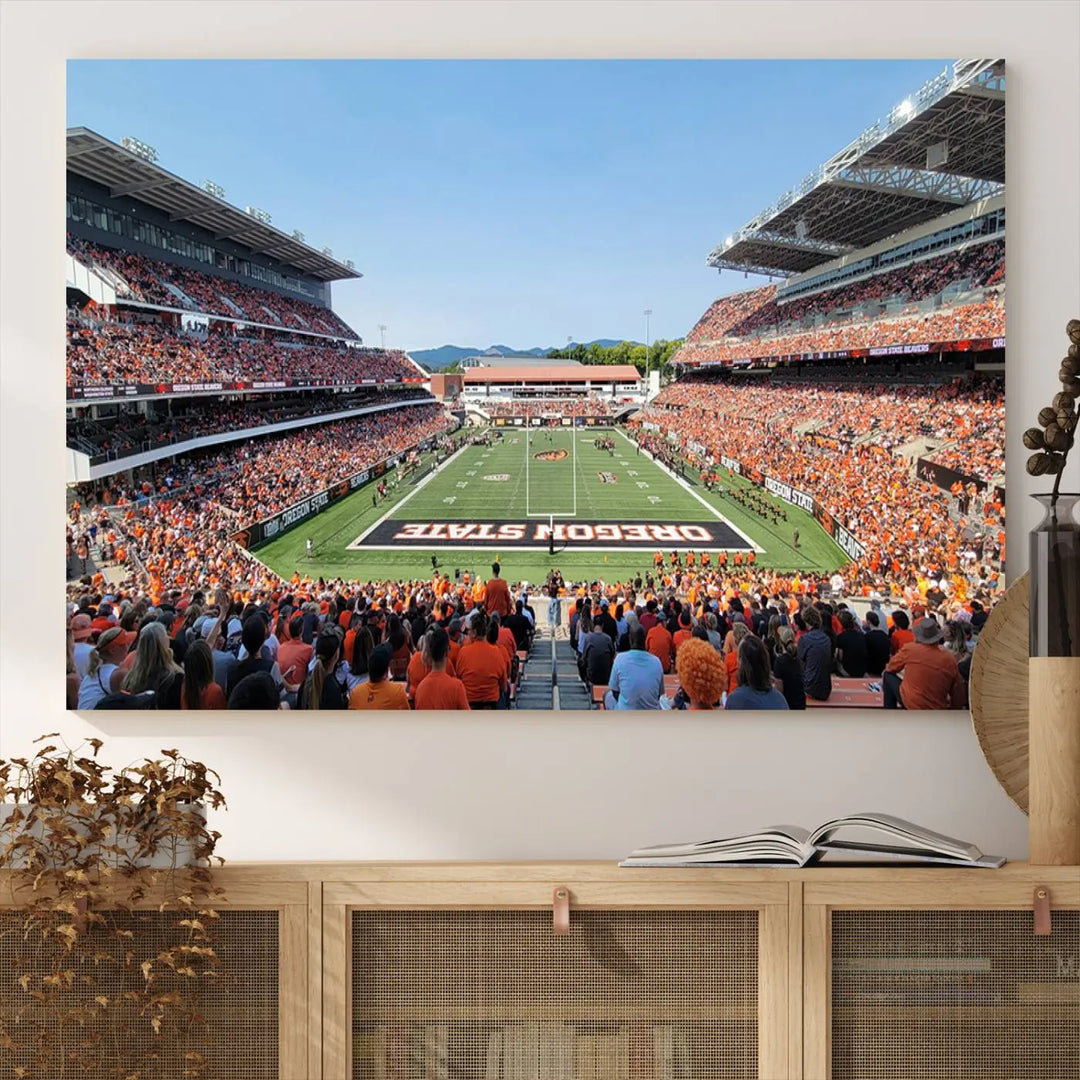 The Oregon State Beavers Football Team Print, featuring a vibrant depiction of Corvallis Reser Stadium on museum-quality canvas, adorns the room.