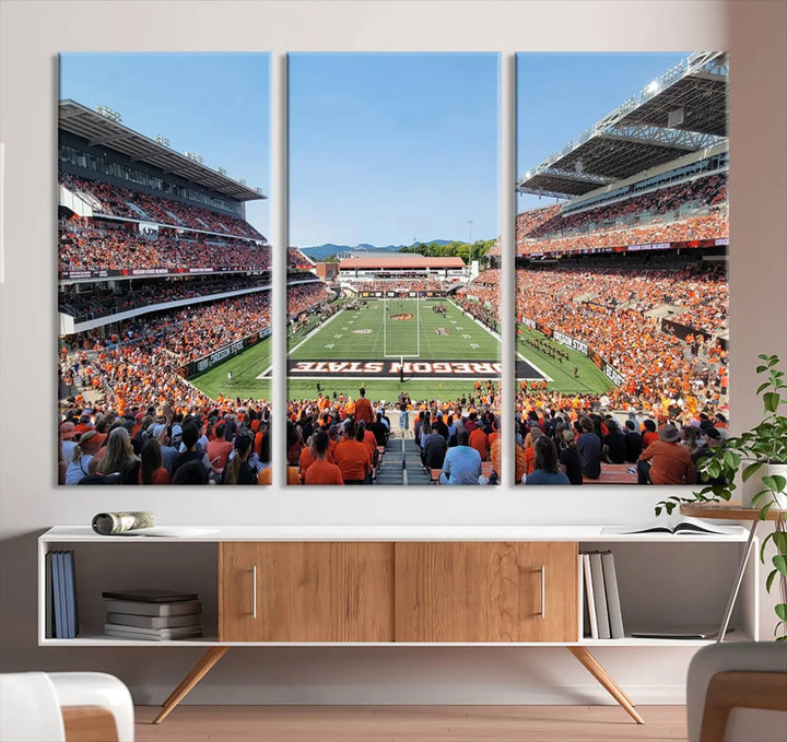 The Oregon State Beavers Football Team Print, featuring a vibrant depiction of Corvallis Reser Stadium on museum-quality canvas, adorns the room.