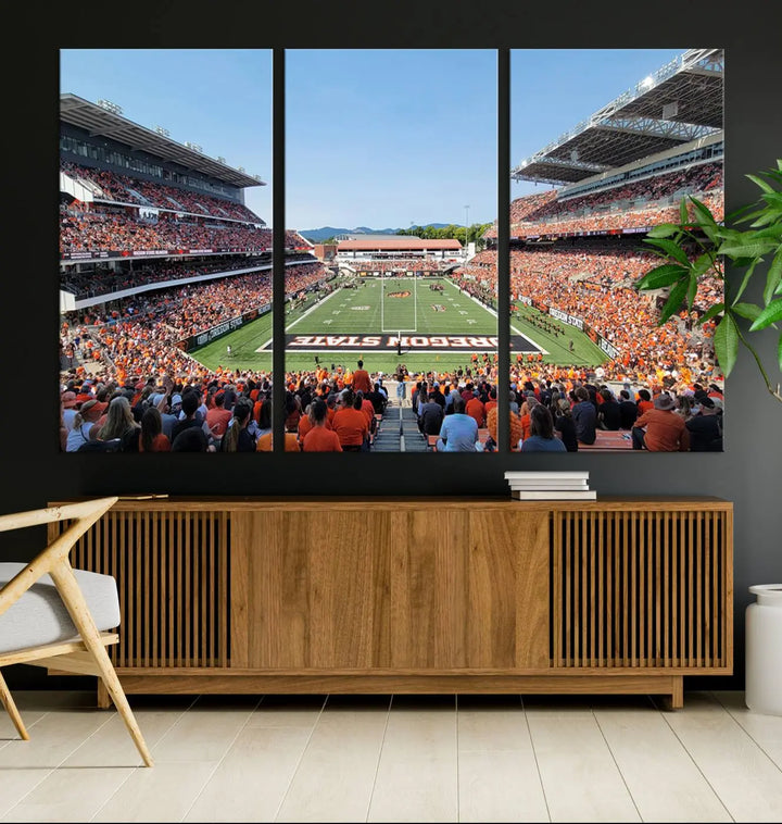 The Oregon State Beavers Football Team Print, featuring a vibrant depiction of Corvallis Reser Stadium on museum-quality canvas, adorns the room.