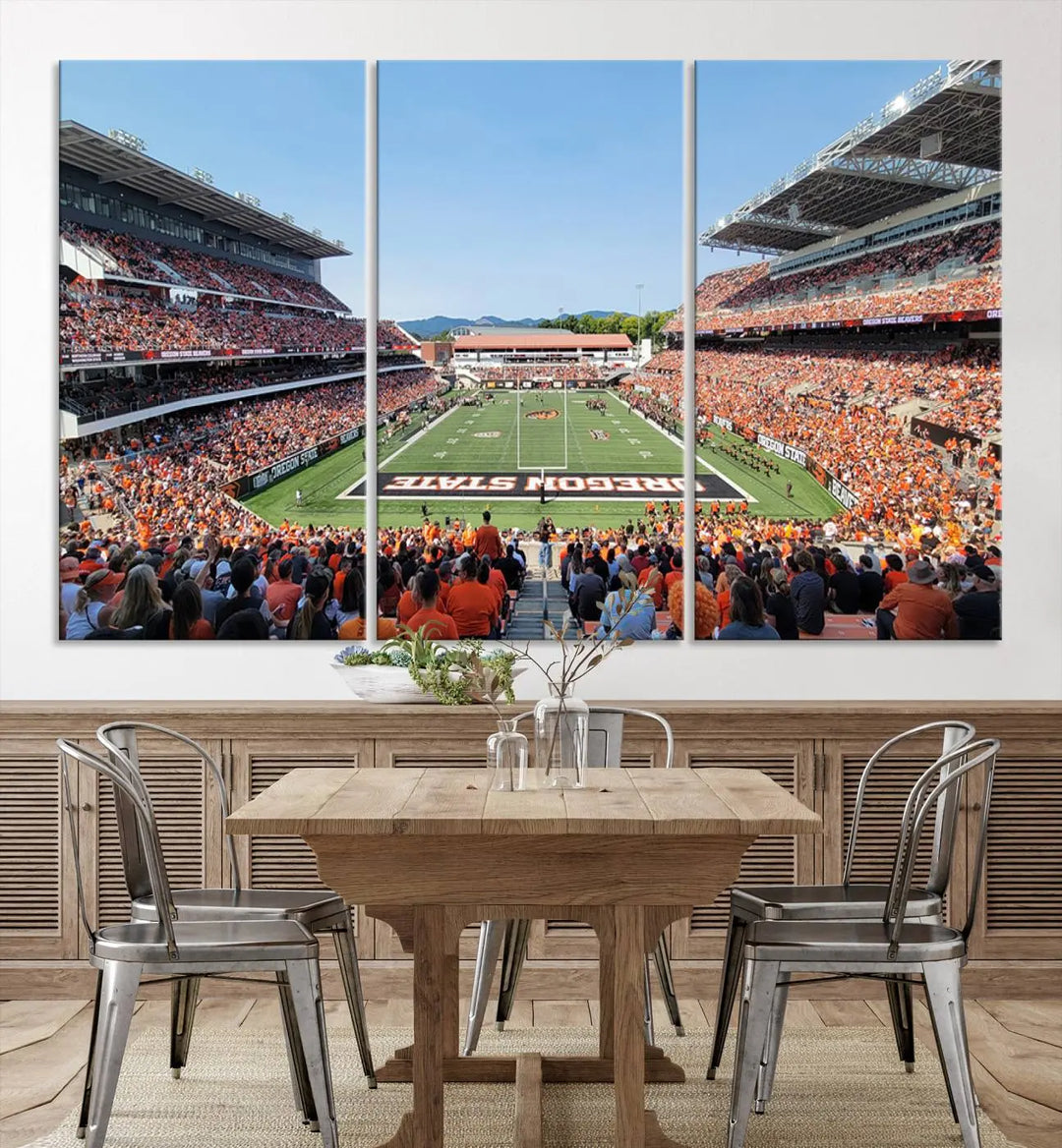 The Oregon State Beavers Football Team Print, featuring a vibrant depiction of Corvallis Reser Stadium on museum-quality canvas, adorns the room.