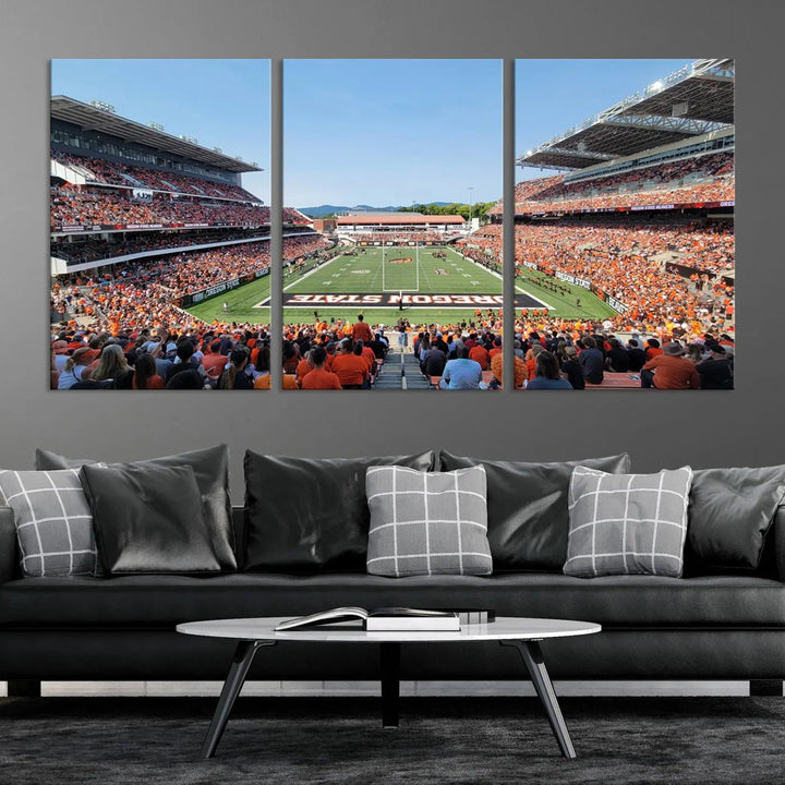 The Oregon State Beavers Football Team Print, featuring a vibrant depiction of Corvallis Reser Stadium on museum-quality canvas, adorns the room.