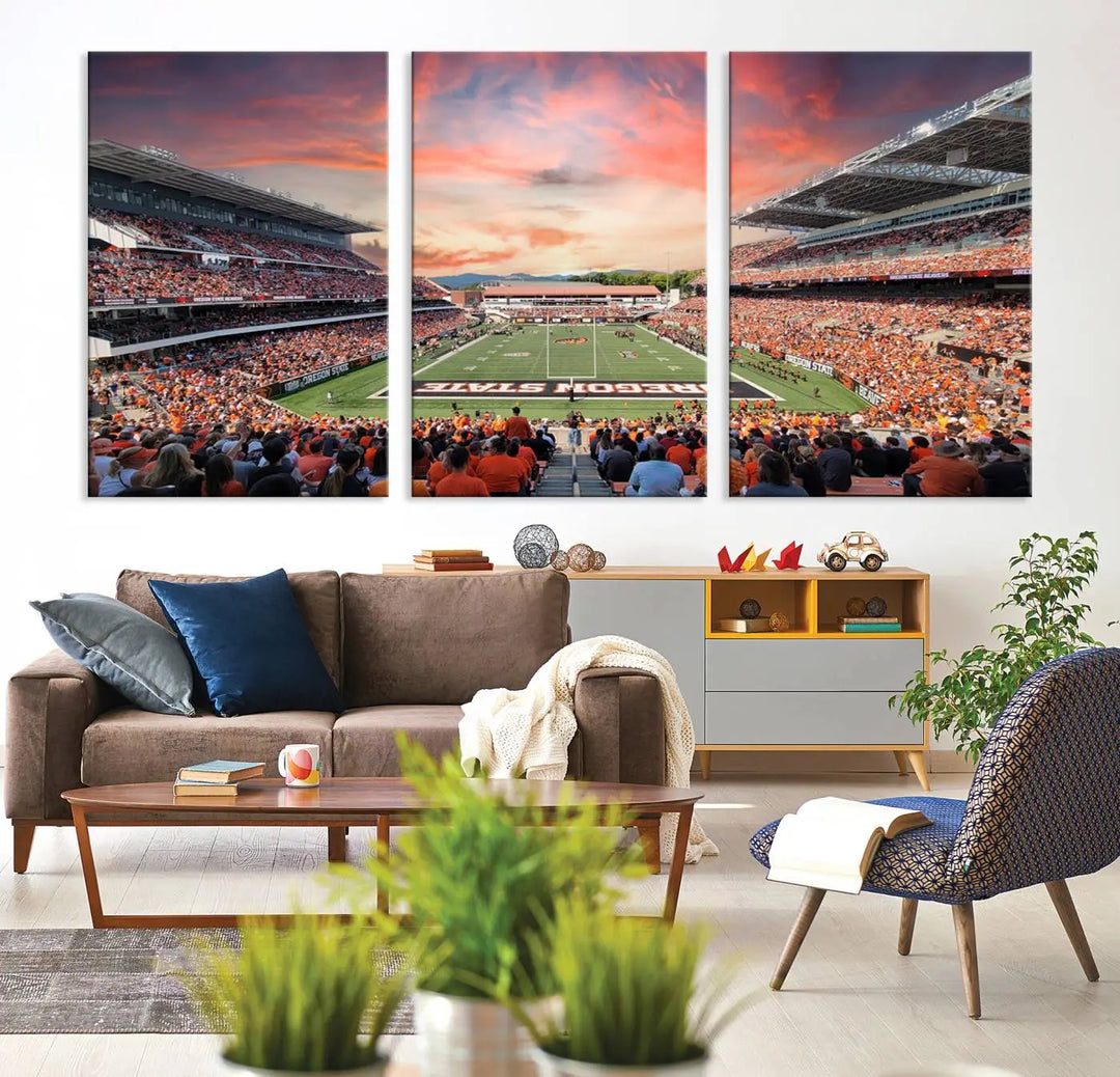 Marvel at a panoramic view of a bustling football stadium at sunset, beautifully captured on museum-quality canvas with high-resolution printing. This Oregon State Beavers Football Team Print of Corvallis Reser Stadium is thoughtfully displayed across three framed panels, making it an ideal gift for sports enthusiasts.