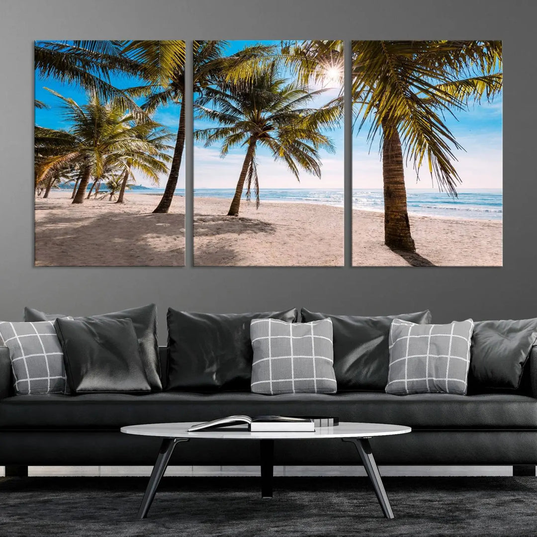 A living room showcasing the Palm Beach Tropical Island Wall Art Canvas Print, a triptych of palm trees on a sandy beach, offered in museum-quality canvas.