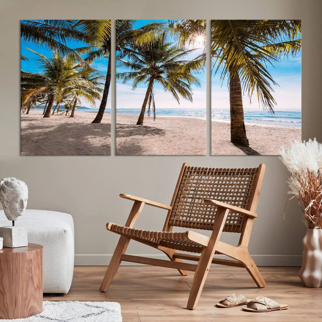 A living room showcasing the Palm Beach Tropical Island Wall Art Canvas Print, a triptych of palm trees on a sandy beach, offered in museum-quality canvas.