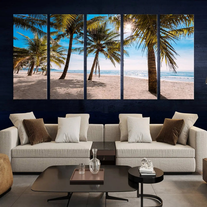 A living room showcasing the Palm Beach Tropical Island Wall Art Canvas Print, a triptych of palm trees on a sandy beach, offered in museum-quality canvas.