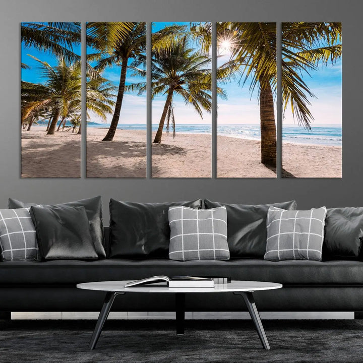 A living room showcasing the Palm Beach Tropical Island Wall Art Canvas Print, a triptych of palm trees on a sandy beach, offered in museum-quality canvas.