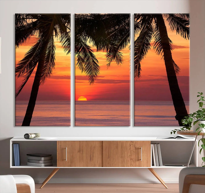 The living room features the "Palm Sunset Sea Ocean Beach Wall Art Canvas Print, Framed Ready to Hang" above the sofa.