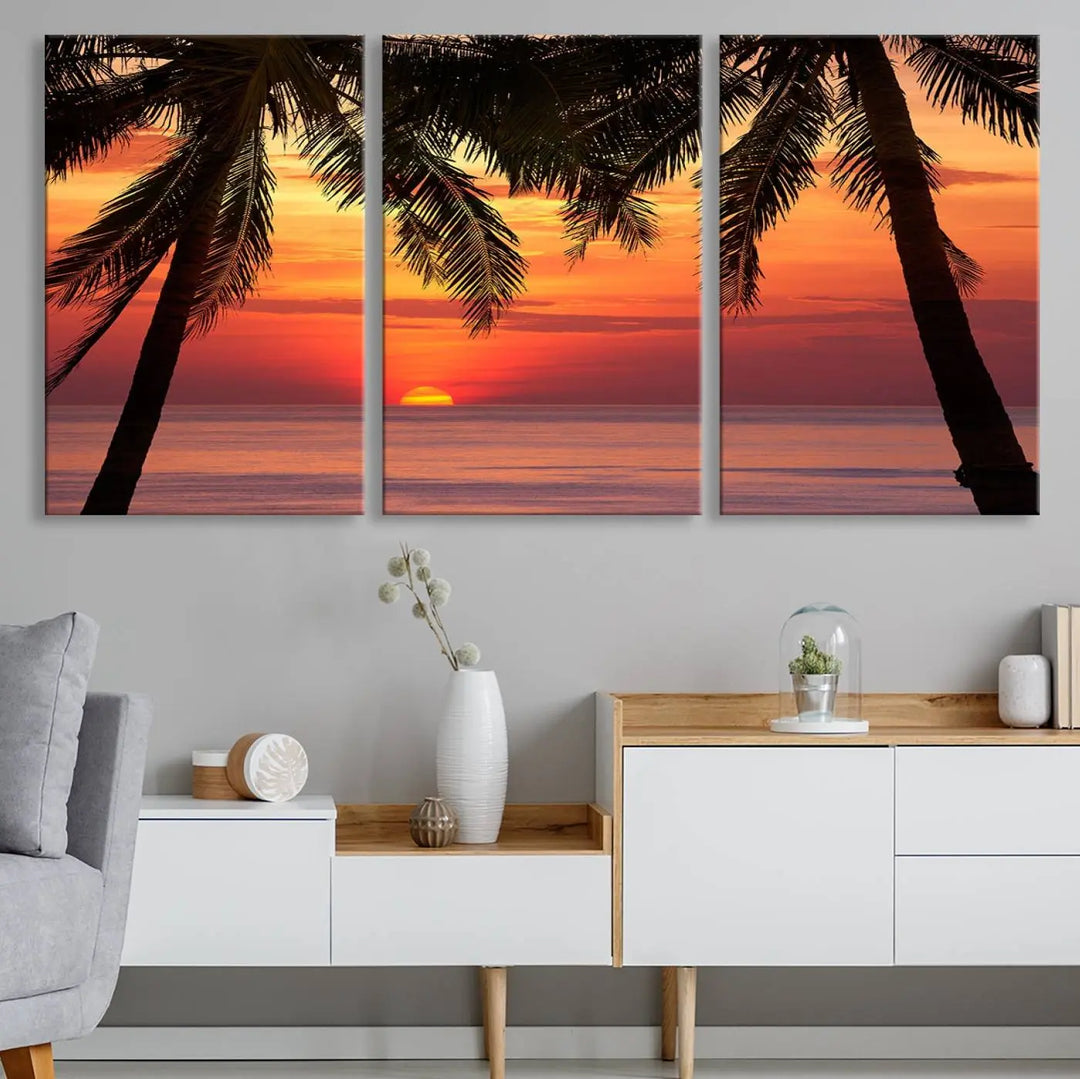 The living room features the "Palm Sunset Sea Ocean Beach Wall Art Canvas Print, Framed Ready to Hang" above the sofa.