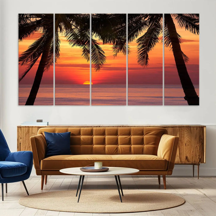 The living room features the "Palm Sunset Sea Ocean Beach Wall Art Canvas Print, Framed Ready to Hang" above the sofa.