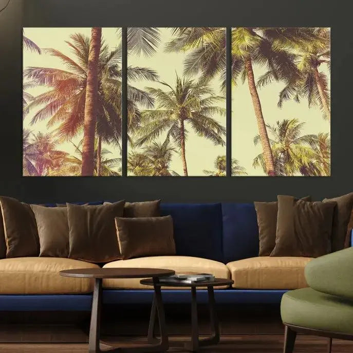 The living room features the Palm Tree Wall Art Tropical Coast Canvas Print, displayed as a triptych on museum-quality canvas. Each piece is gallery wrapped for a polished look.