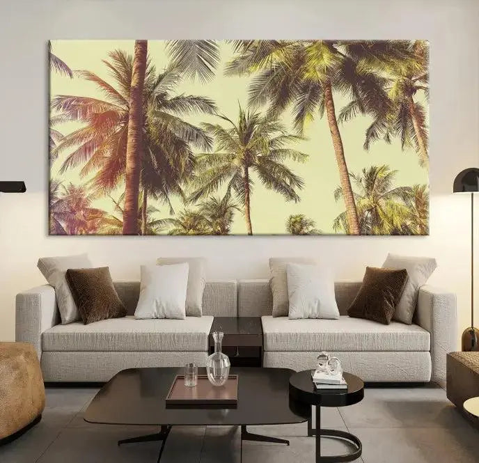 The living room features the Palm Tree Wall Art Tropical Coast Canvas Print, displayed as a triptych on museum-quality canvas. Each piece is gallery wrapped for a polished look.