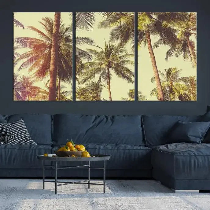 The living room features the Palm Tree Wall Art Tropical Coast Canvas Print, displayed as a triptych on museum-quality canvas. Each piece is gallery wrapped for a polished look.