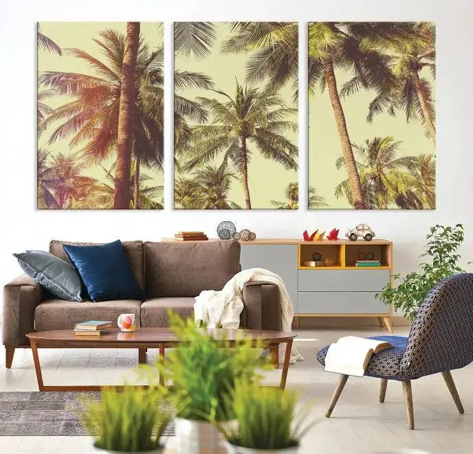 The living room features the Palm Tree Wall Art Tropical Coast Canvas Print, displayed as a triptych on museum-quality canvas. Each piece is gallery wrapped for a polished look.