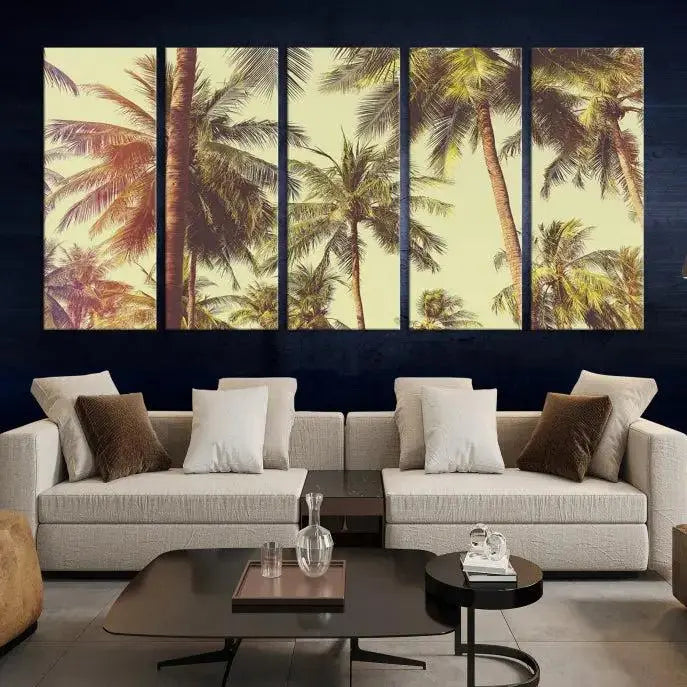 The living room features the Palm Tree Wall Art Tropical Coast Canvas Print, displayed as a triptych on museum-quality canvas. Each piece is gallery wrapped for a polished look.