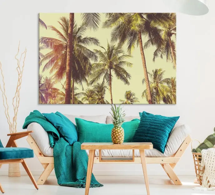 The living room features the Palm Tree Wall Art Tropical Coast Canvas Print, displayed as a triptych on museum-quality canvas. Each piece is gallery wrapped for a polished look.