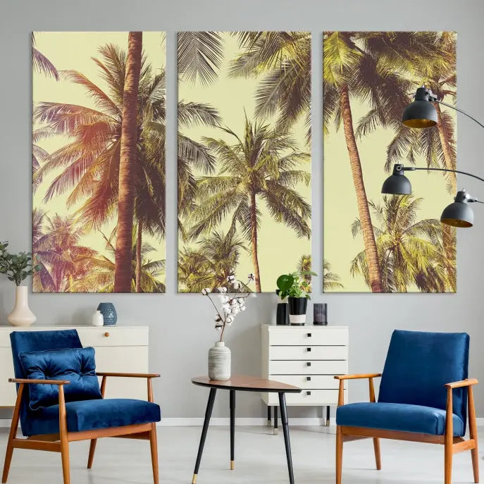 The living room features the Palm Tree Wall Art Tropical Coast Canvas Print, displayed as a triptych on museum-quality canvas. Each piece is gallery wrapped for a polished look.