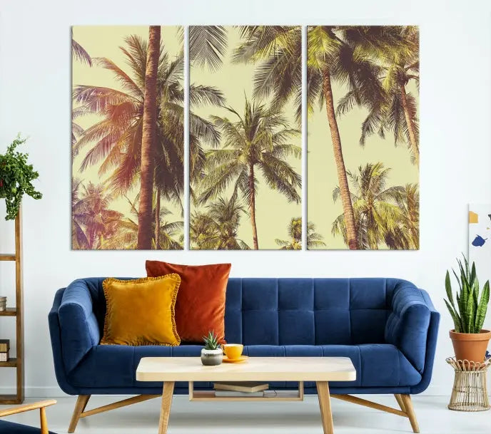 The living room features the Palm Tree Wall Art Tropical Coast Canvas Print, displayed as a triptych on museum-quality canvas. Each piece is gallery wrapped for a polished look.