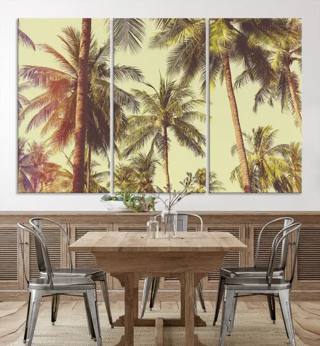 The living room features the Palm Tree Wall Art Tropical Coast Canvas Print, displayed as a triptych on museum-quality canvas. Each piece is gallery wrapped for a polished look.