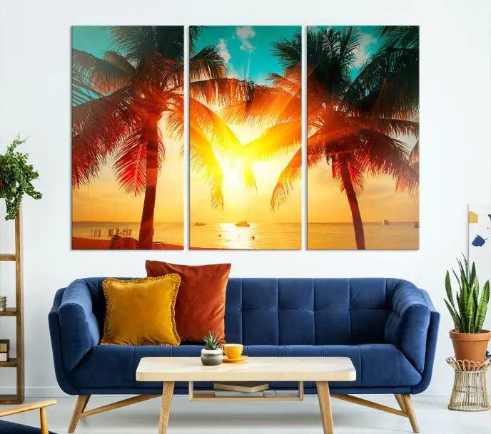 The Palm and Sunset Beach Wall Art Canvas Print is a gallery-wrapped triptych depicting a tropical sunset with palm trees on museum-quality canvas and finished with a UV-protective coating.