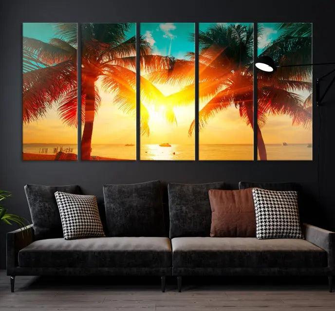 The Palm and Sunset Beach Wall Art Canvas Print is a gallery-wrapped triptych depicting a tropical sunset with palm trees on museum-quality canvas and finished with a UV-protective coating.