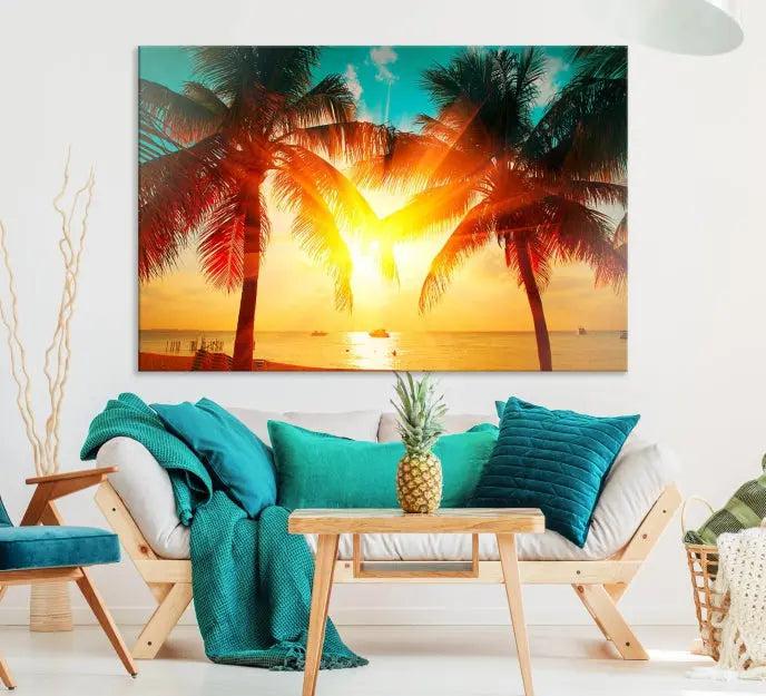 The Palm and Sunset Beach Wall Art Canvas Print is a gallery-wrapped triptych depicting a tropical sunset with palm trees on museum-quality canvas and finished with a UV-protective coating.