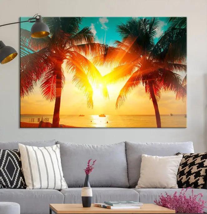 The Palm and Sunset Beach Wall Art Canvas Print is a gallery-wrapped triptych depicting a tropical sunset with palm trees on museum-quality canvas and finished with a UV-protective coating.