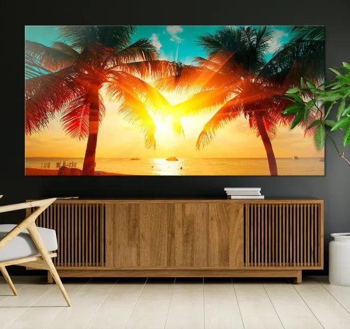 The Palm and Sunset Beach Wall Art Canvas Print is a gallery-wrapped triptych depicting a tropical sunset with palm trees on museum-quality canvas and finished with a UV-protective coating.