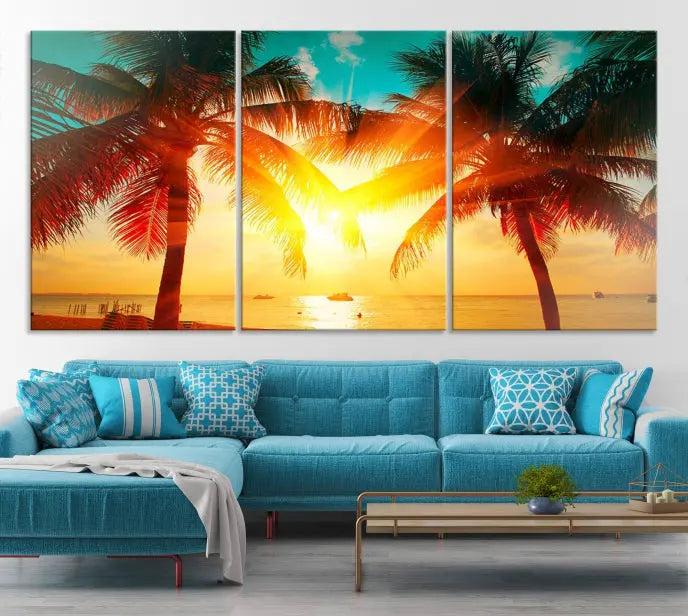 The Palm and Sunset Beach Wall Art Canvas Print is a gallery-wrapped triptych depicting a tropical sunset with palm trees on museum-quality canvas and finished with a UV-protective coating.