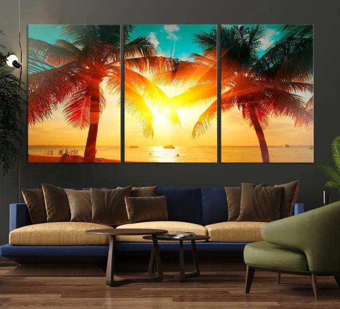 The Palm and Sunset Beach Wall Art Canvas Print is a gallery-wrapped triptych depicting a tropical sunset with palm trees on museum-quality canvas and finished with a UV-protective coating.