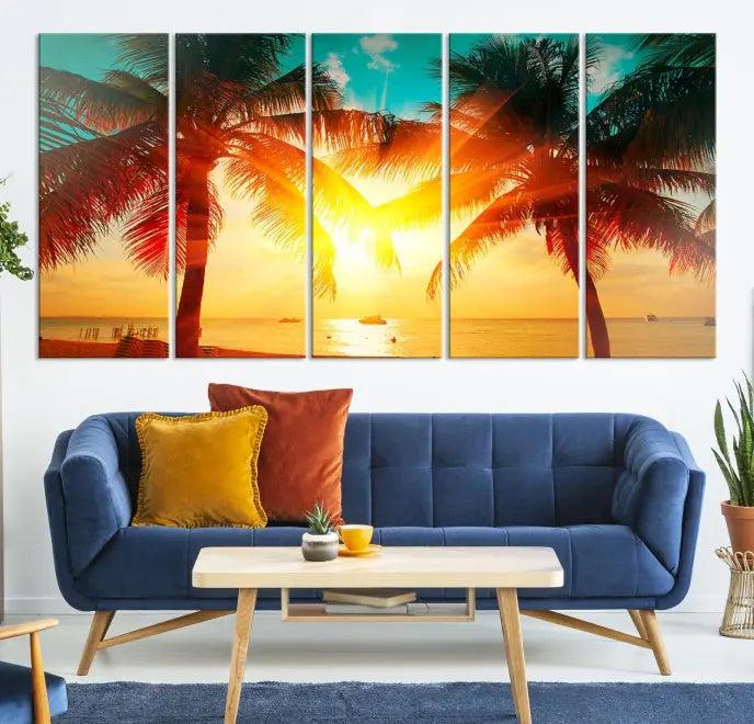 The Palm and Sunset Beach Wall Art Canvas Print is a gallery-wrapped triptych depicting a tropical sunset with palm trees on museum-quality canvas and finished with a UV-protective coating.