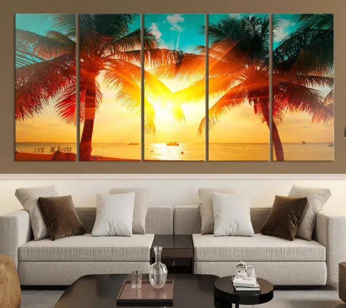 The Palm and Sunset Beach Wall Art Canvas Print is a gallery-wrapped triptych depicting a tropical sunset with palm trees on museum-quality canvas and finished with a UV-protective coating.