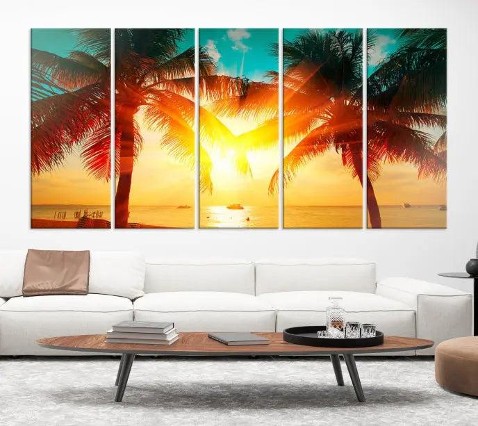 The Palm and Sunset Beach Wall Art Canvas Print is a gallery-wrapped triptych depicting a tropical sunset with palm trees on museum-quality canvas and finished with a UV-protective coating.