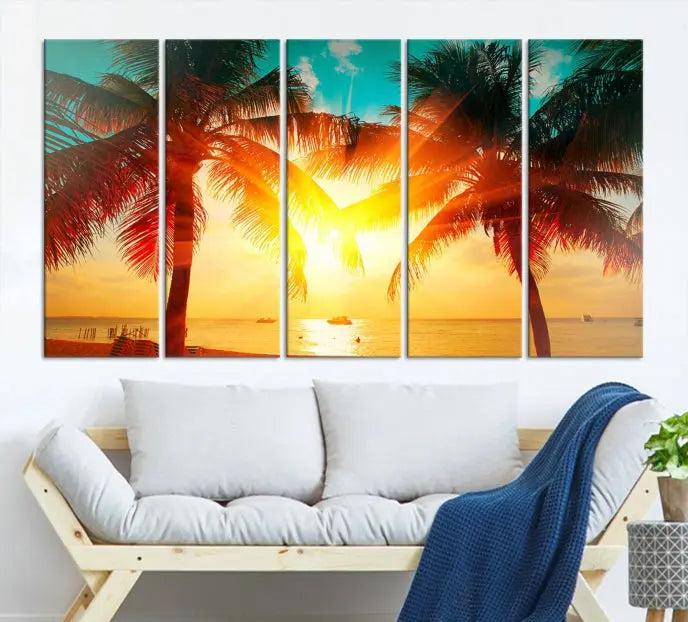 The Palm and Sunset Beach Wall Art Canvas Print is a gallery-wrapped triptych depicting a tropical sunset with palm trees on museum-quality canvas and finished with a UV-protective coating.