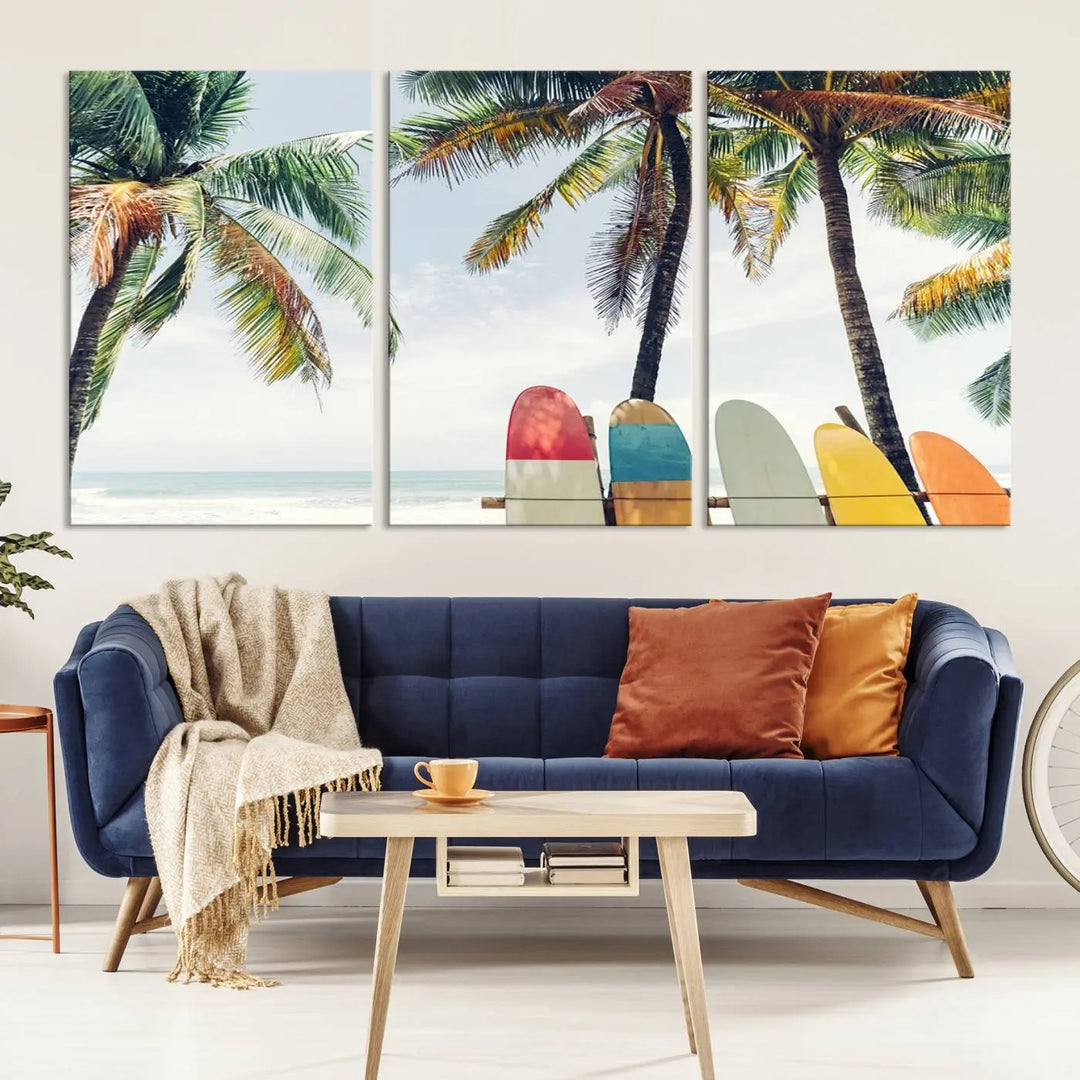 The room showcases The Palm and Surfing Board Wall Art Canvas Print, a triptych of palm trees and surfboards by the beach, elegantly gallery wrapped for a sophisticated finish.